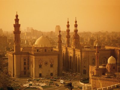 The 14th-century Mosque of Sultan Hasan (l), next to the Mosque of al-Rifa'i (r), which was begun in the 19th century. 1869-1911 Cairo, Egypt